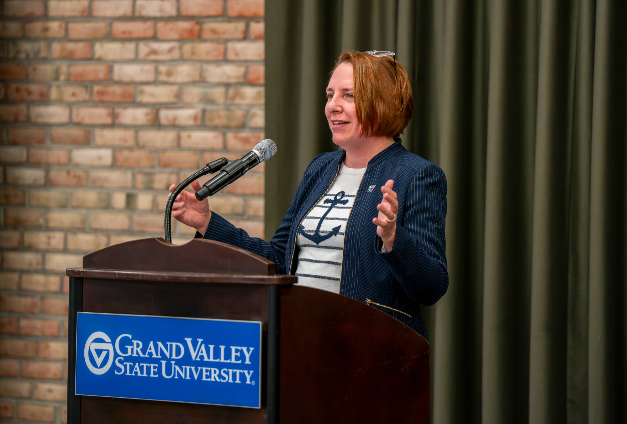 Vice President and Chief Executive of OMNi Kara Van Dam speaks during the Alpha Sigma Lambda Honor Society induction ceremony as part of the Sigma Lambda Sigma Chapter of GVSU on February 5.
